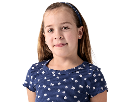 Cora, a person living with XLH, smiling