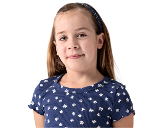 Cora, a person living with XLH, smiling